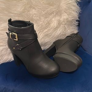 Black leather ankle zip booties